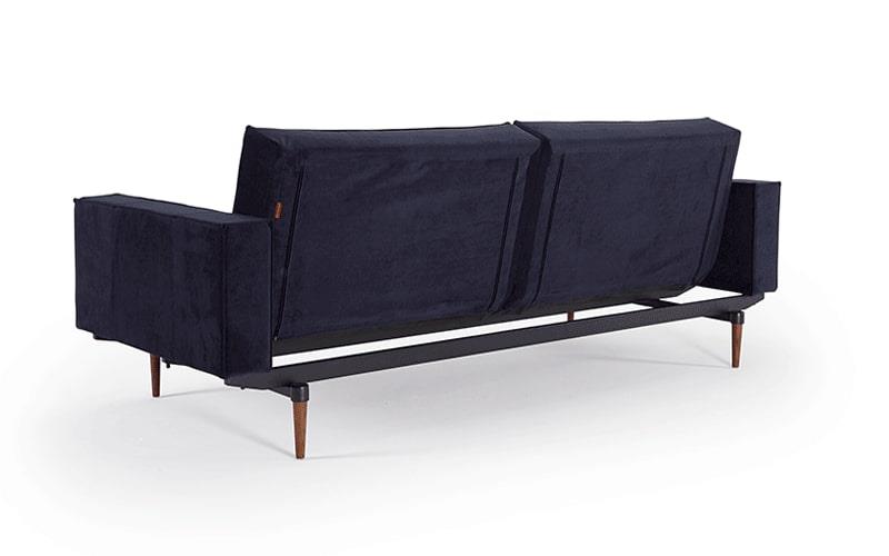 Splitback king single sofa bed with fabric arms and dark styletto legs - innovation living